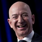 Holiday Outlook Dips Stocks, Bezos Finance Advice, and More Financial News