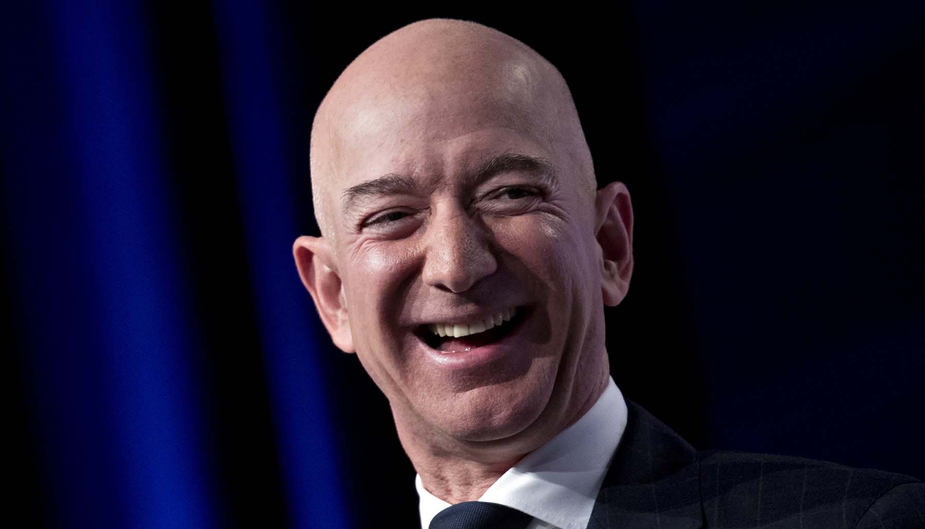 Holiday Outlook Dips Stocks, Bezos Finance Advice, and More Financial News